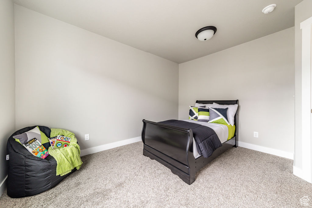 Bedroom with carpet
