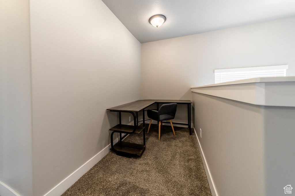 Office featuring carpet floors and baseboards