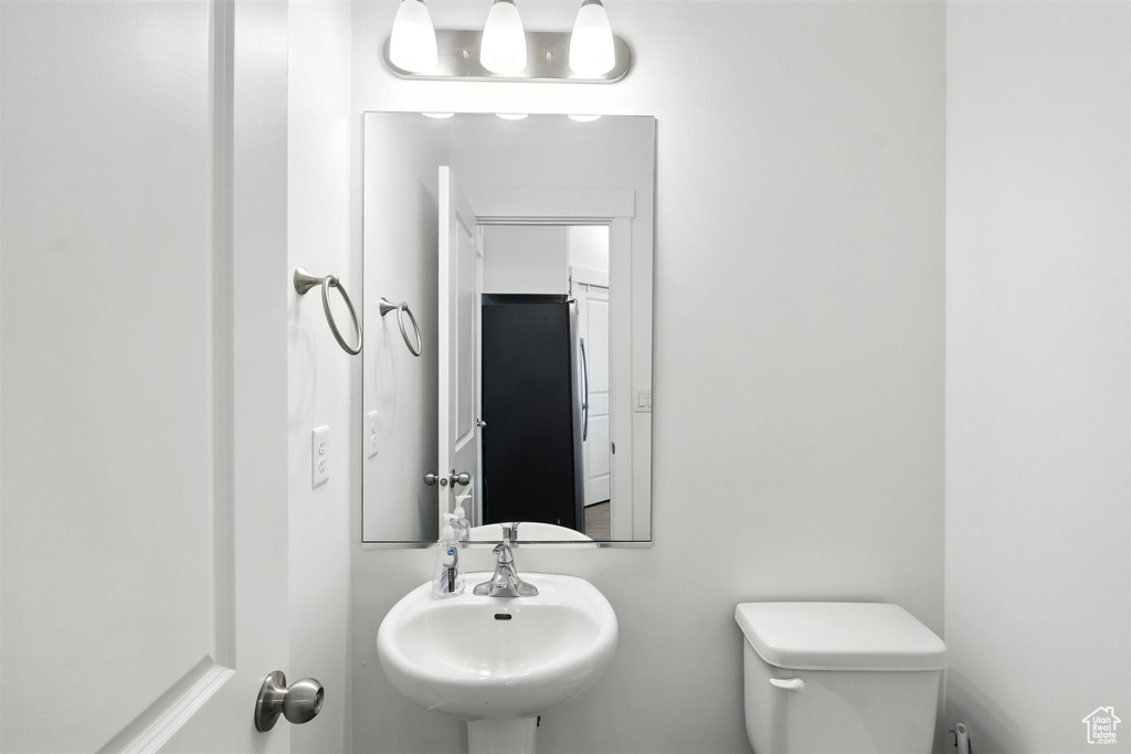 Bathroom with toilet and a sink