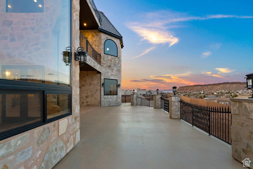 Patio terrace at dusk with a patio area