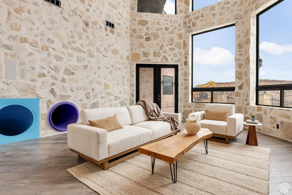 Living area with hardwood / wood-style flooring
