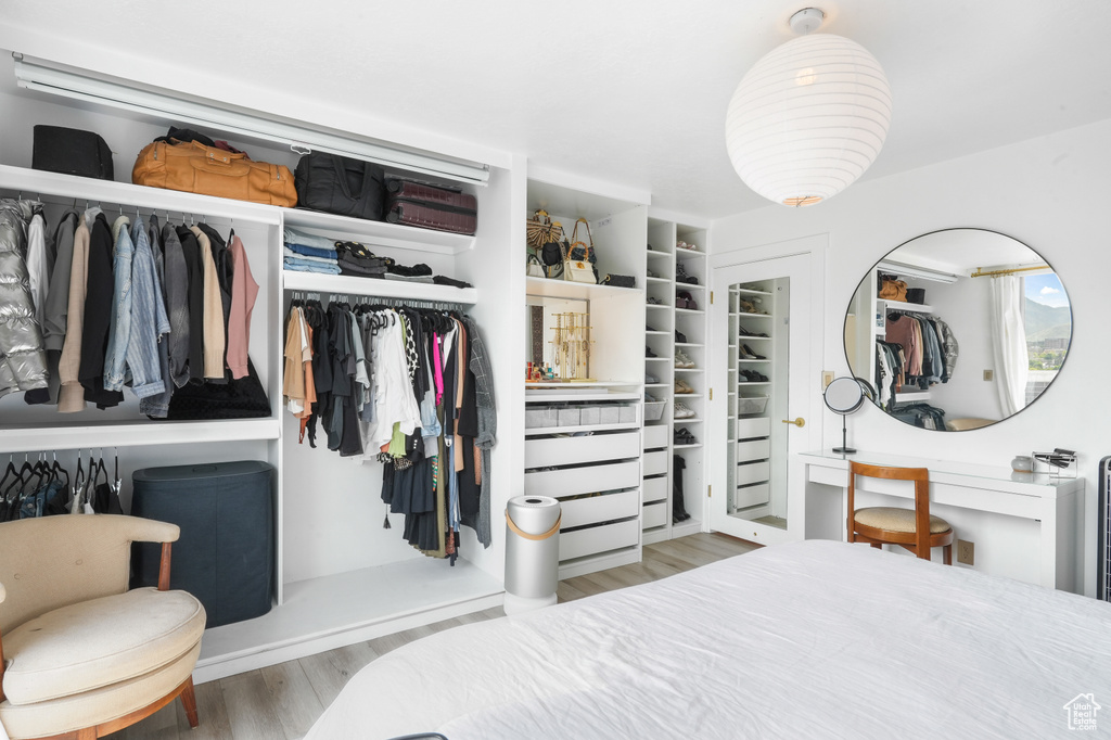Bedroom featuring a closet and wood finished floors