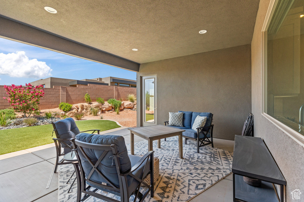 View of patio with outdoor lounge area