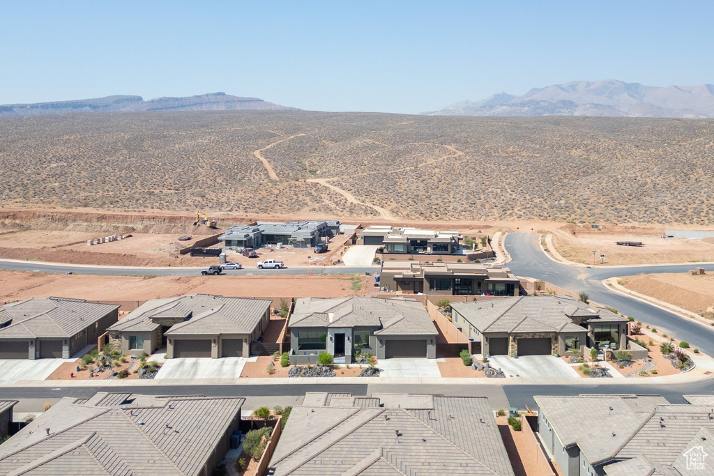 Aerial view of residential area with a mountain backdrop
