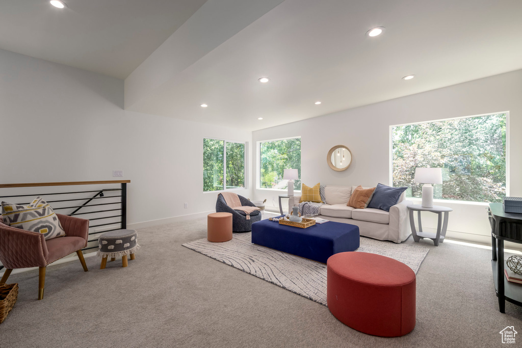 Living room featuring carpet, plenty of natural light, and recessed lighting