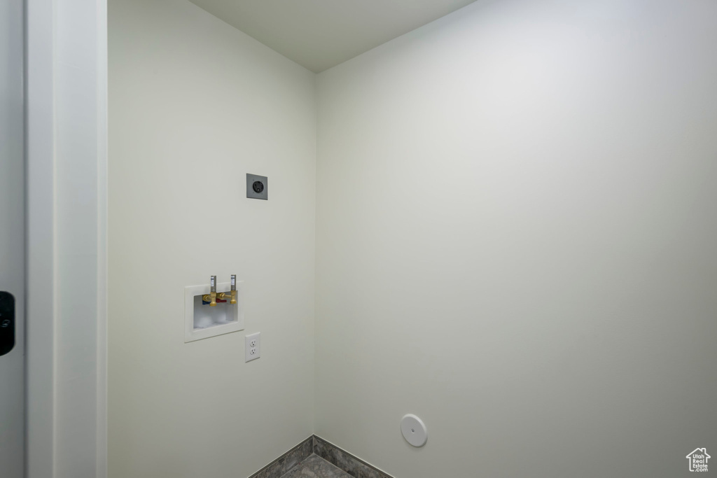 Washroom featuring hookup for a washing machine, electric dryer hookup, and gas dryer hookup
