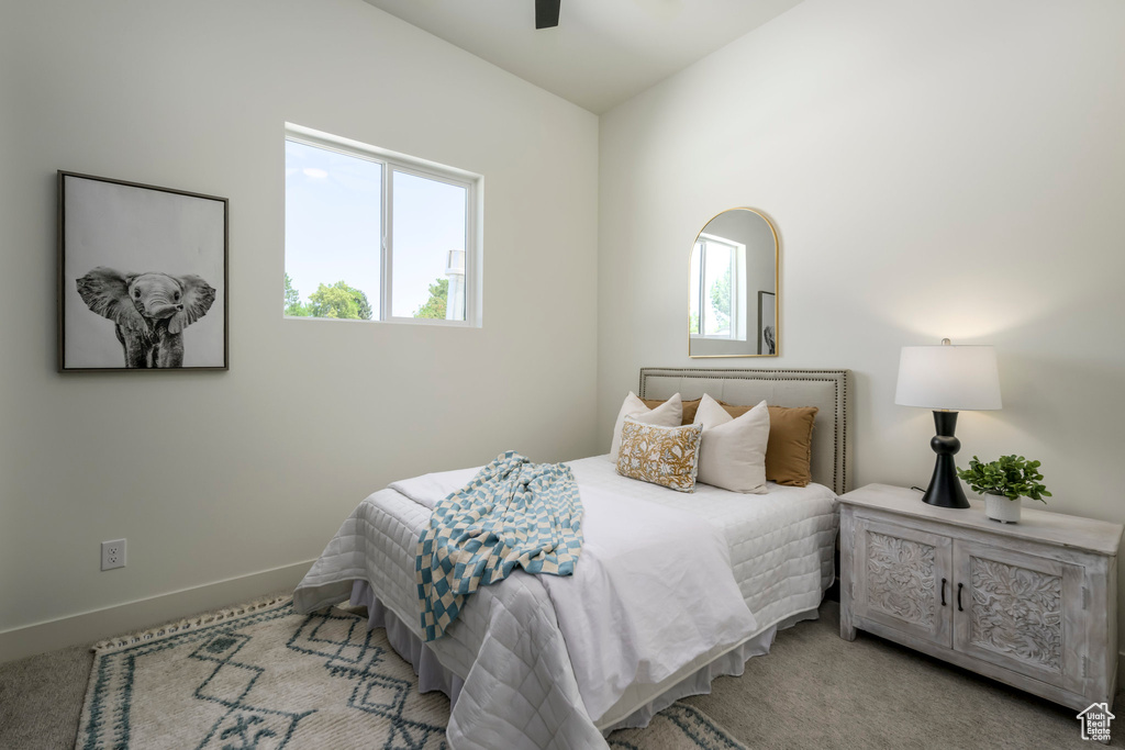 Bedroom with carpet and ceiling fan