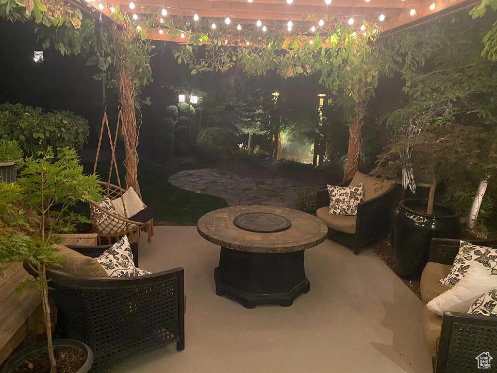 View of patio / terrace featuring an outdoor fire pit