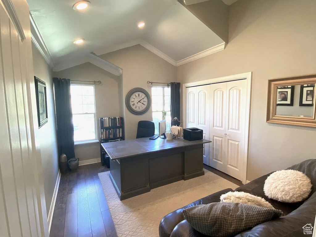 Office featuring hardwood / wood-style flooring, lofted ceiling, ornamental molding, and recessed lighting