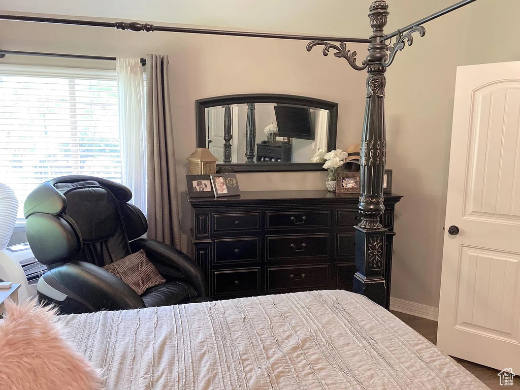 Bedroom featuring baseboards
