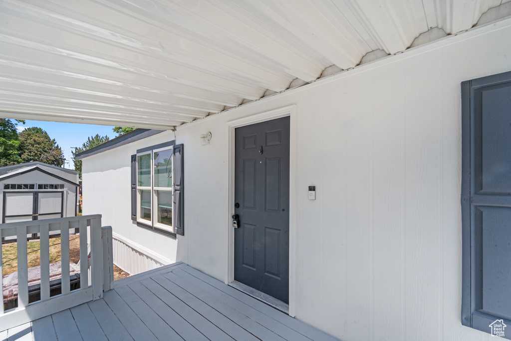Wooden deck with a storage unit