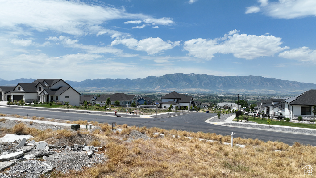View of mountain backdrop with nearby suburban area