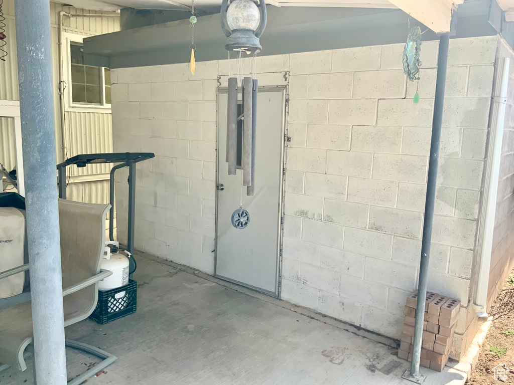 Below grade area with concrete block wall