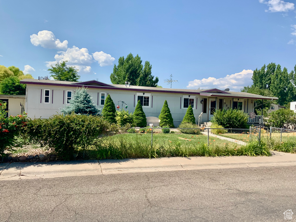 View of front of property with a fenced front yard