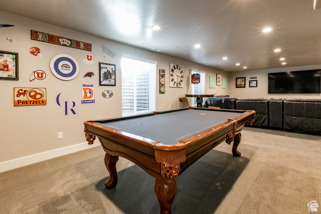 Game room with light colored carpet, recessed lighting, pool table, and a textured ceiling