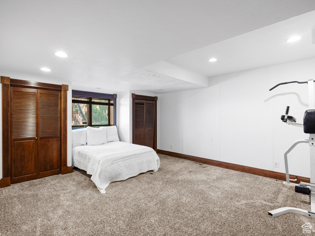 Bedroom featuring carpet flooring and recessed lighting