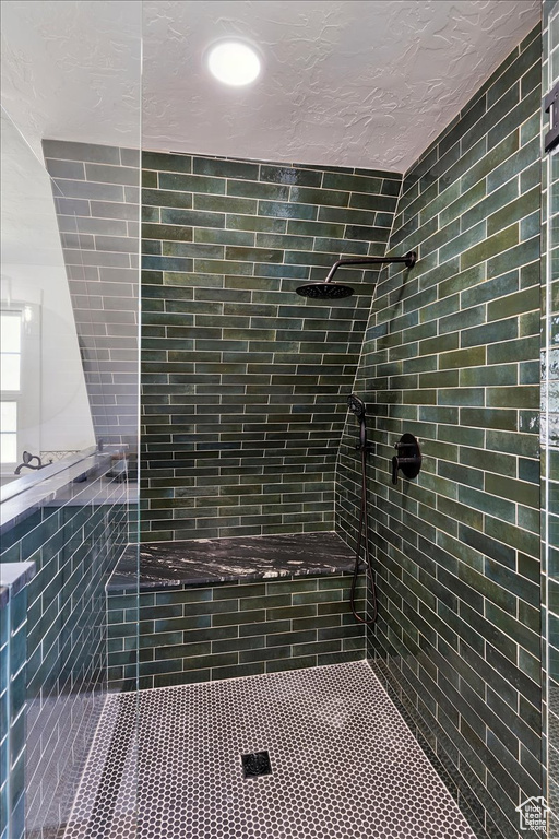 Bathroom with tiled shower