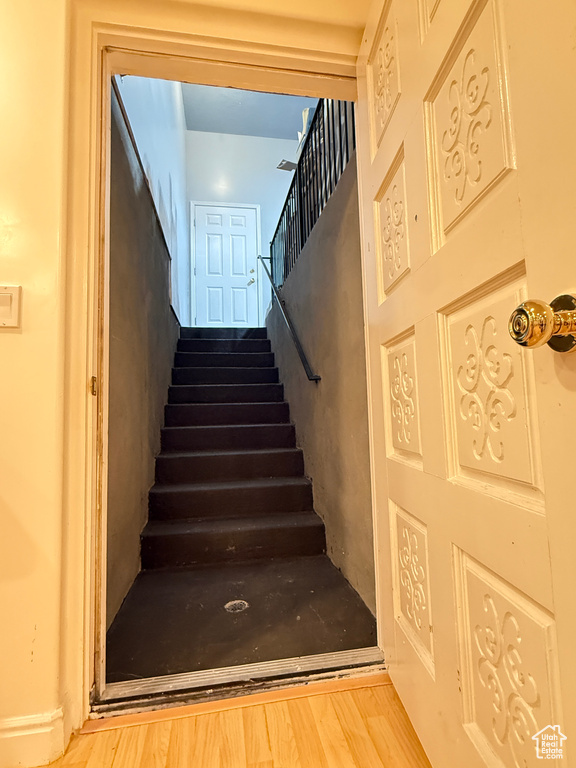 Stairway with wood finished floors