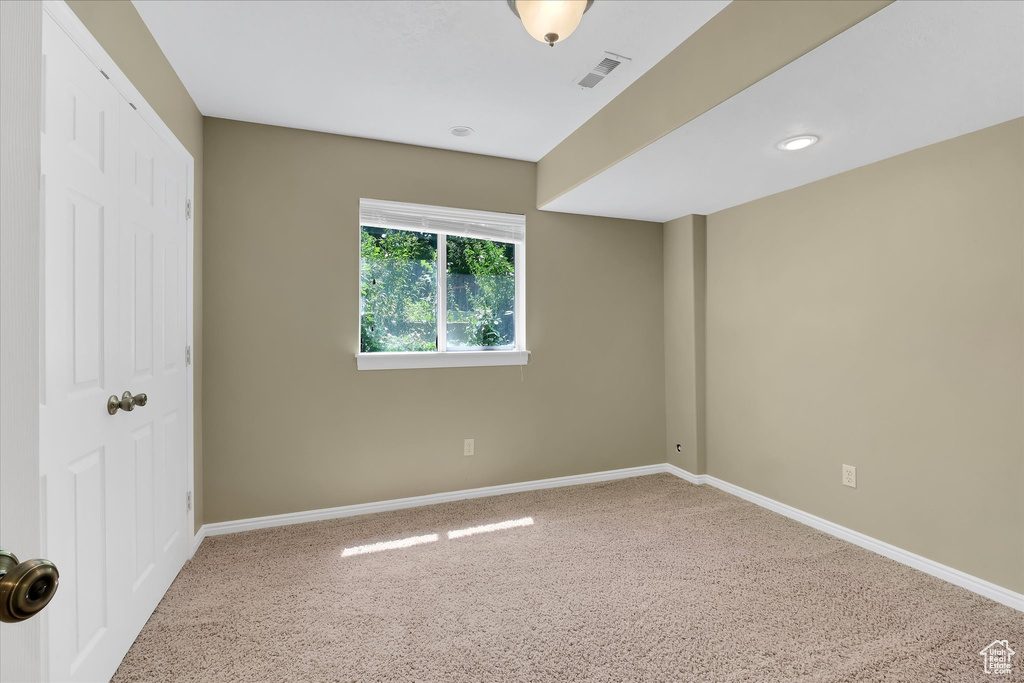 Unfurnished bedroom featuring carpet