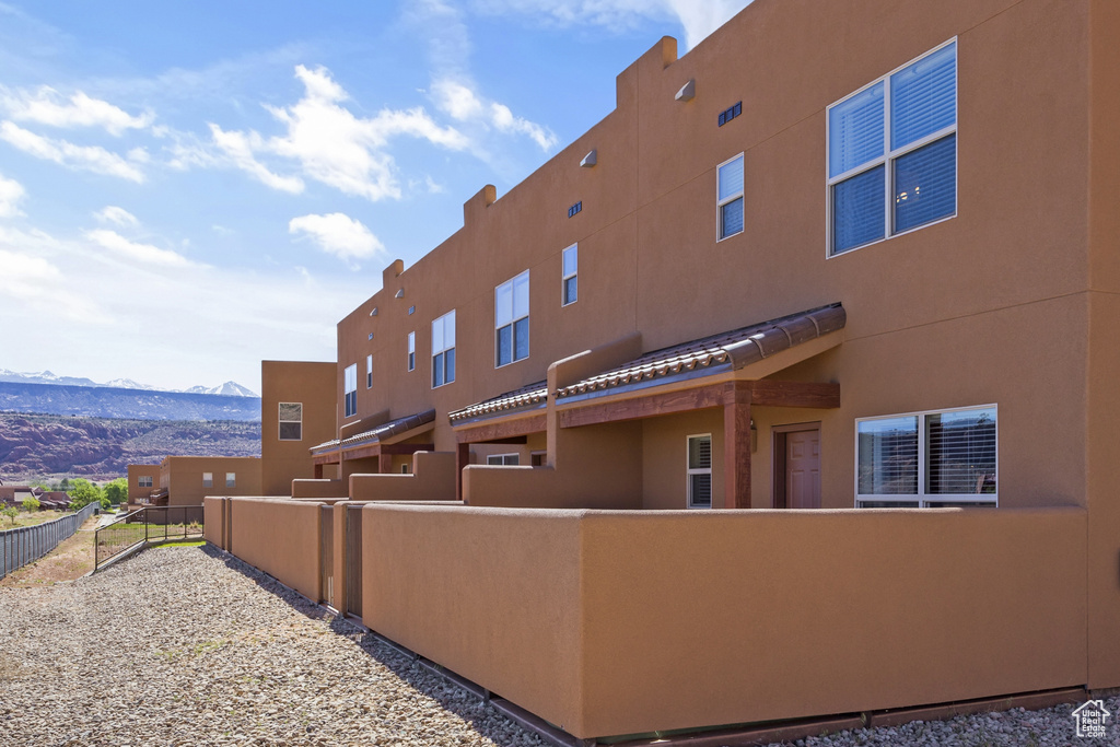 View of building exterior featuring a mountain view