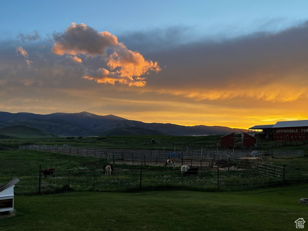 View of mountain background featuring rural landscape