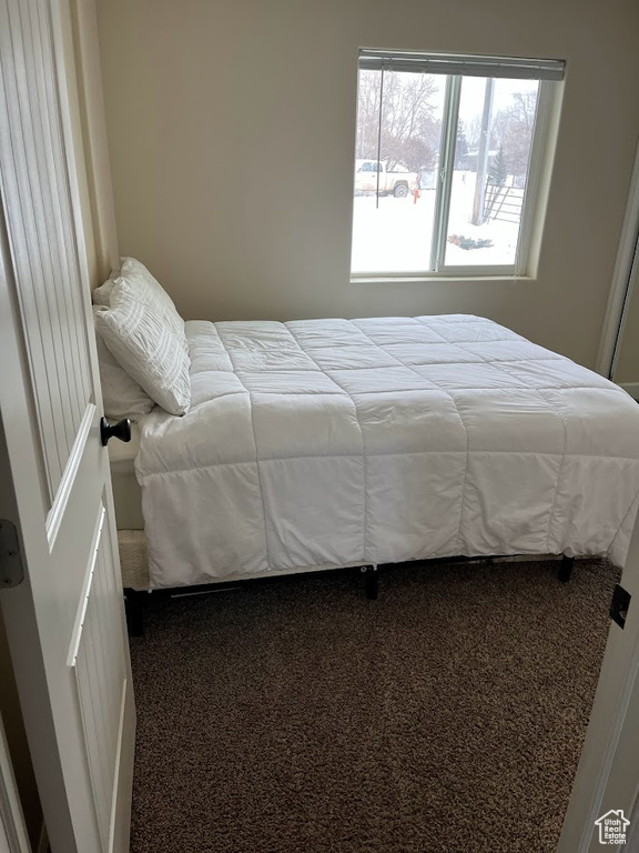 Bedroom featuring carpet