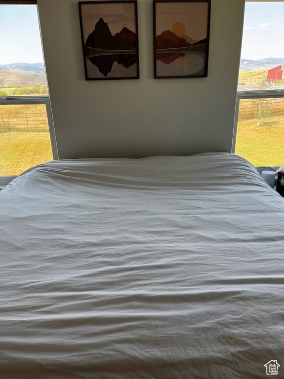 Bedroom with a mountain view