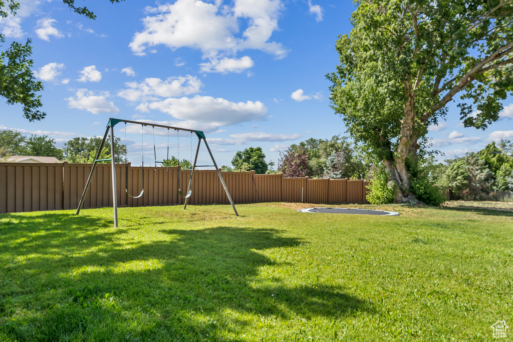 View of yard featuring a playground