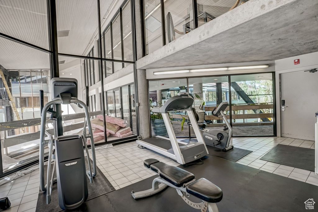 Workout area with floor to ceiling windows