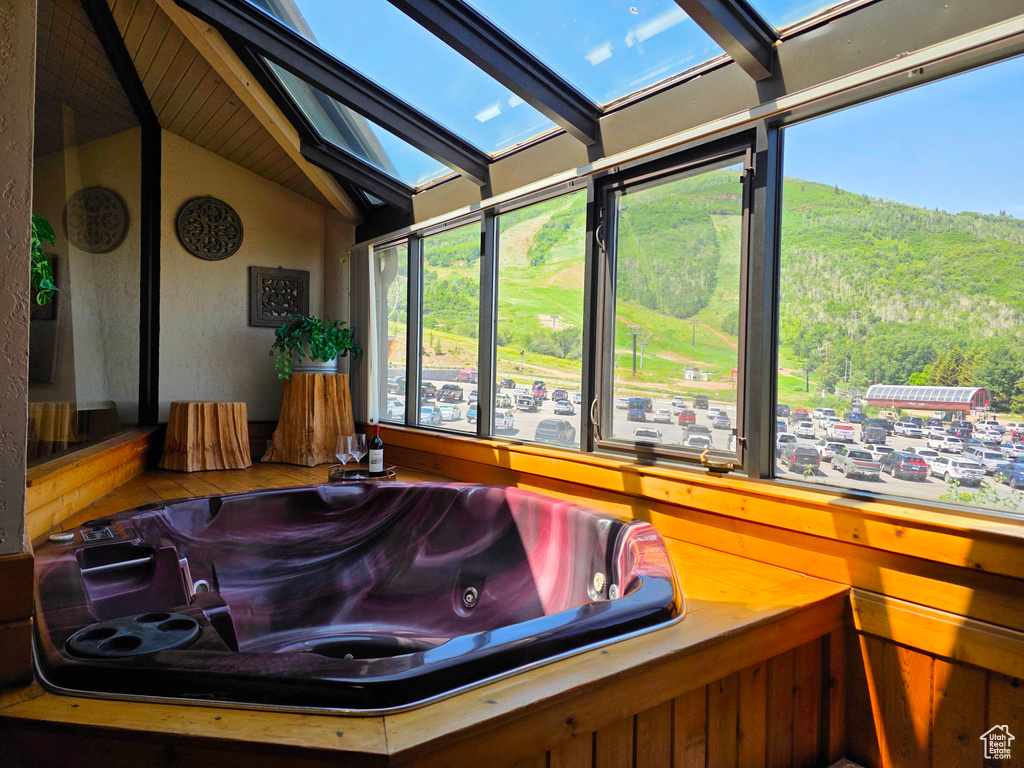 Bathroom with vaulted ceiling and a skylight