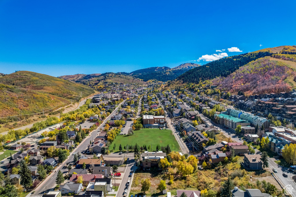 Aerial view of residential area with mountains