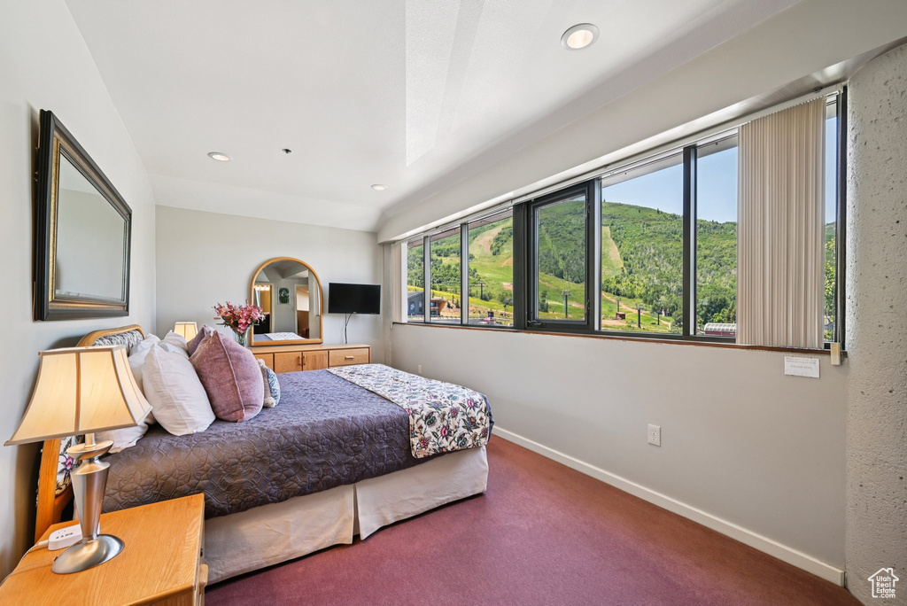 Carpeted bedroom featuring recessed lighting