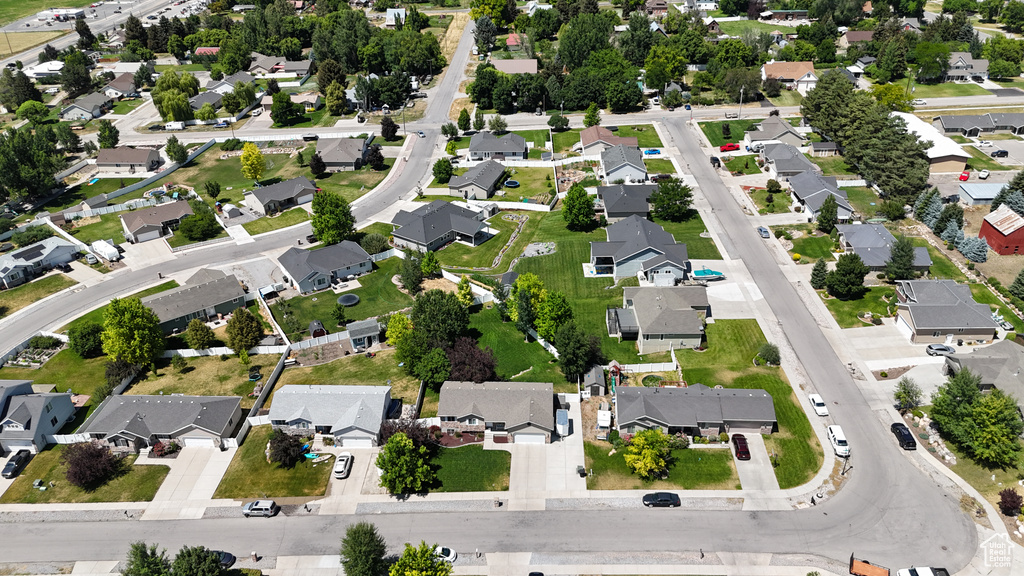 Aerial overview of property's location featuring nearby suburban area