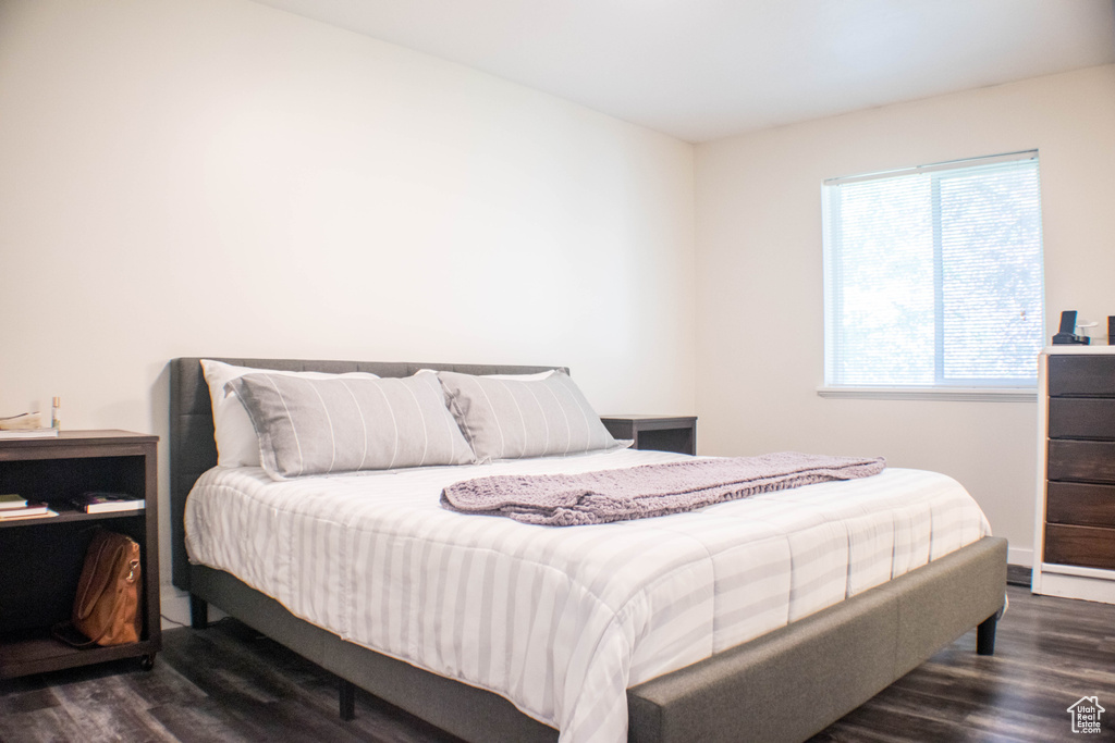 Bedroom with wood finished floors