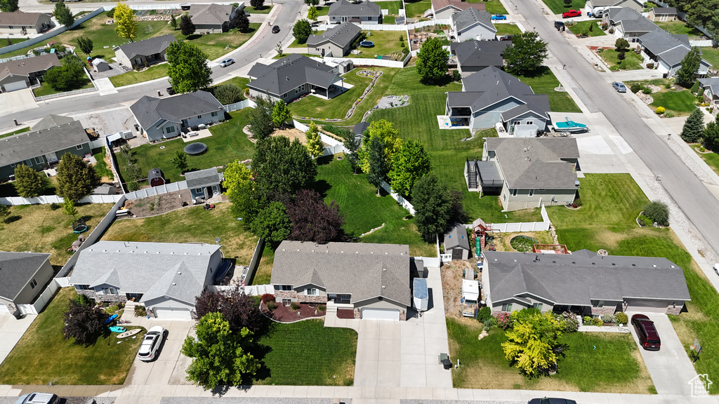 Aerial view of property's location featuring nearby suburban area