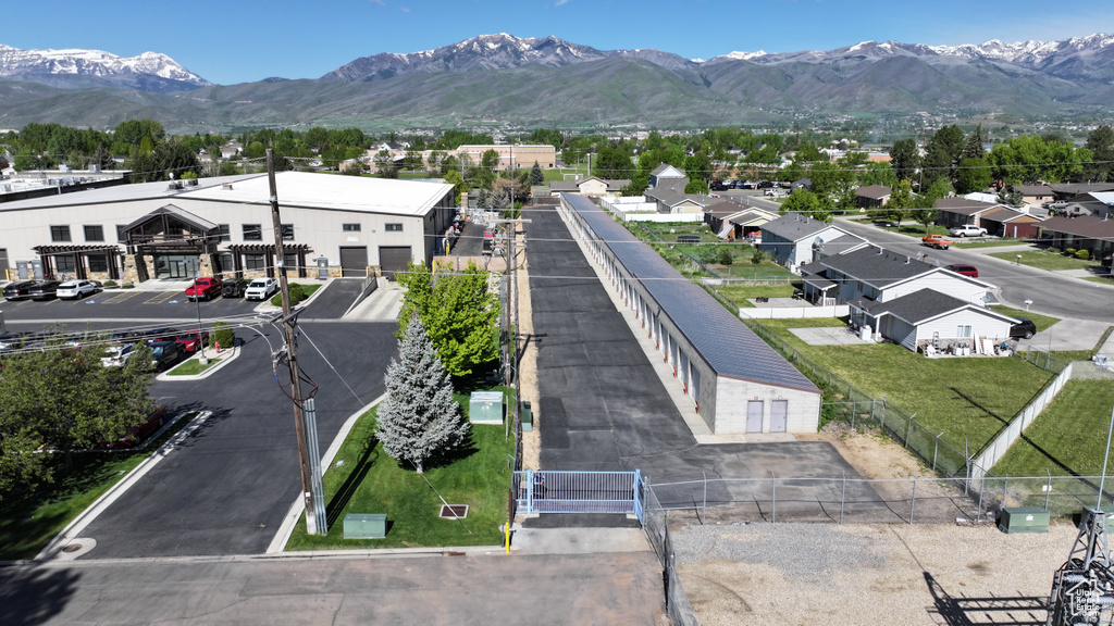 Aerial view of residential area with a mountainous background