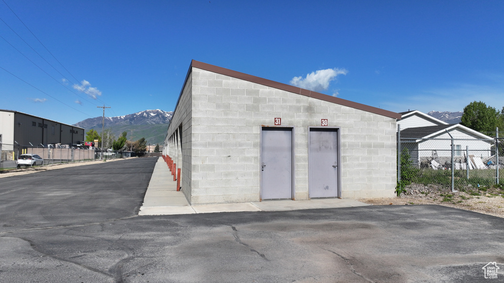 View of outbuilding featuring a mountain view