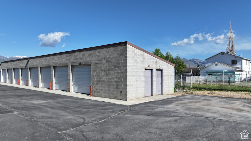 Garage featuring a mountain view