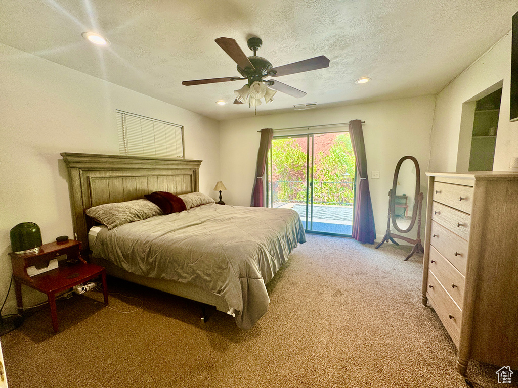 Bedroom with access to outside, light carpet, recessed lighting, a textured ceiling, and ceiling fan