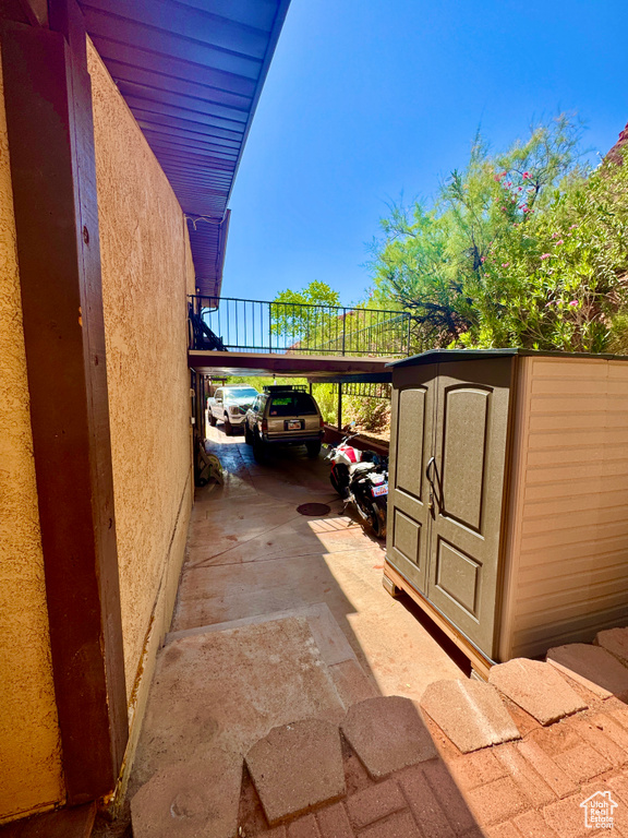 View of patio featuring a carport