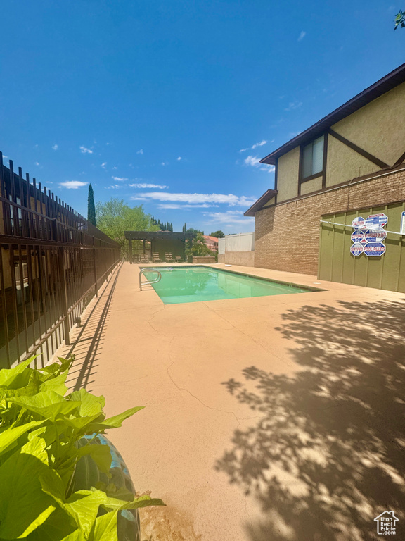 View of pool with a patio area