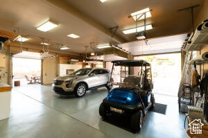 Garage featuring a garage door opener
