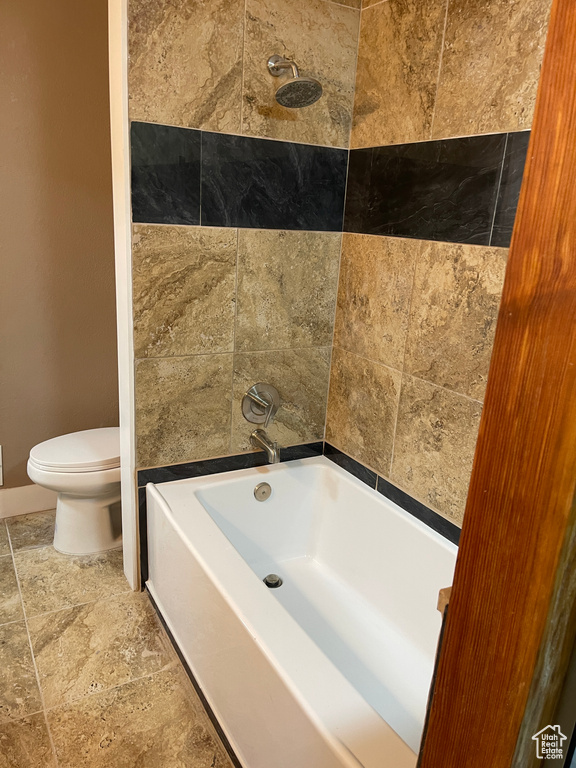 Full bath with a tub to relax in and a shower