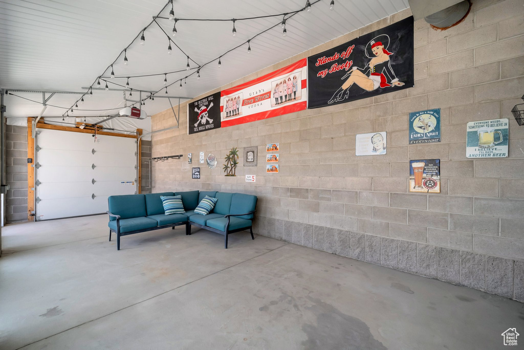 Garage featuring a garage door opener
