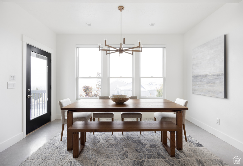 Dining area featuring a chandelier and plenty of natural light