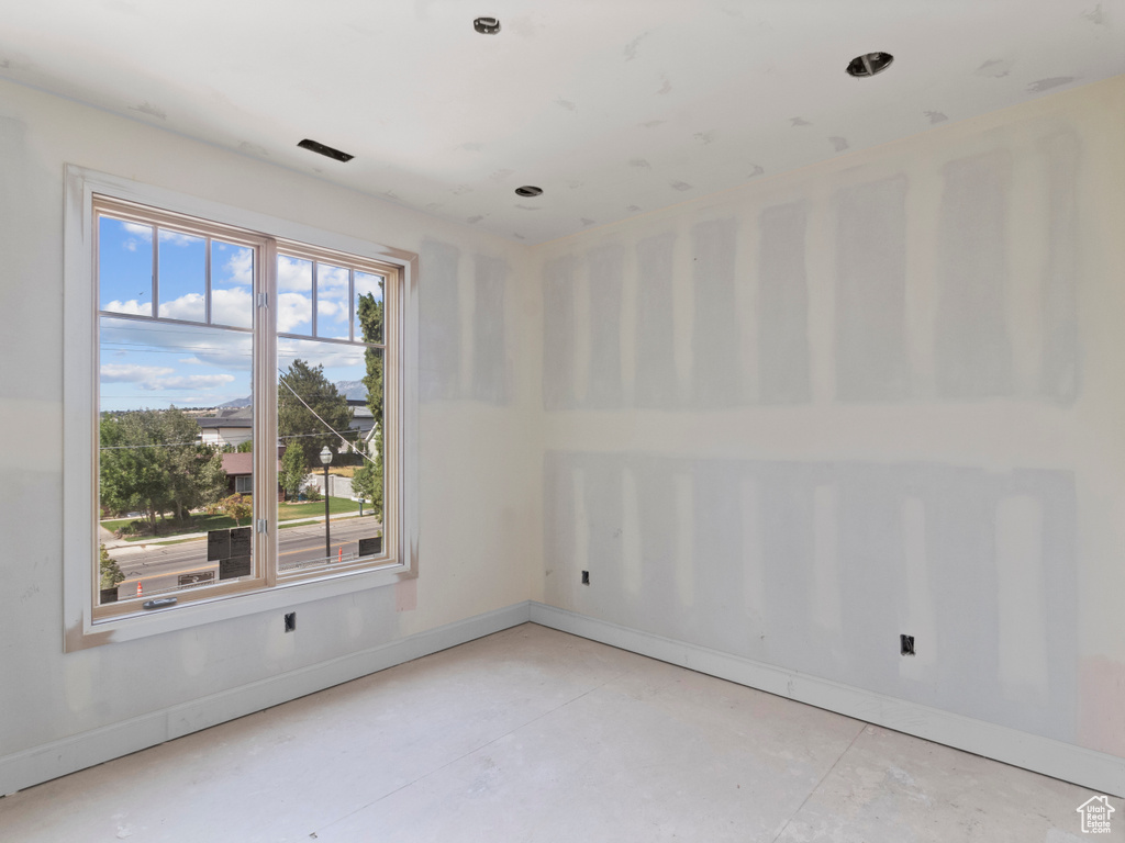 Spare room with concrete floors