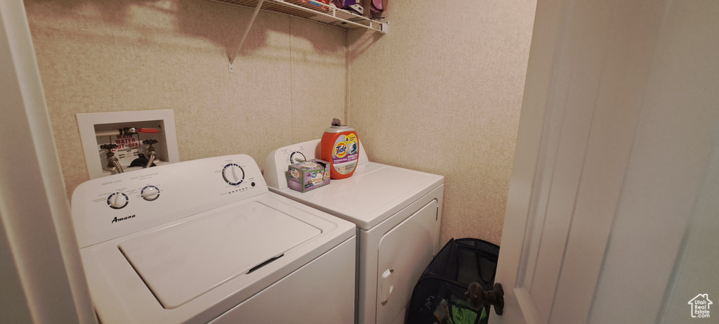 Laundry room featuring washing machine and dryer