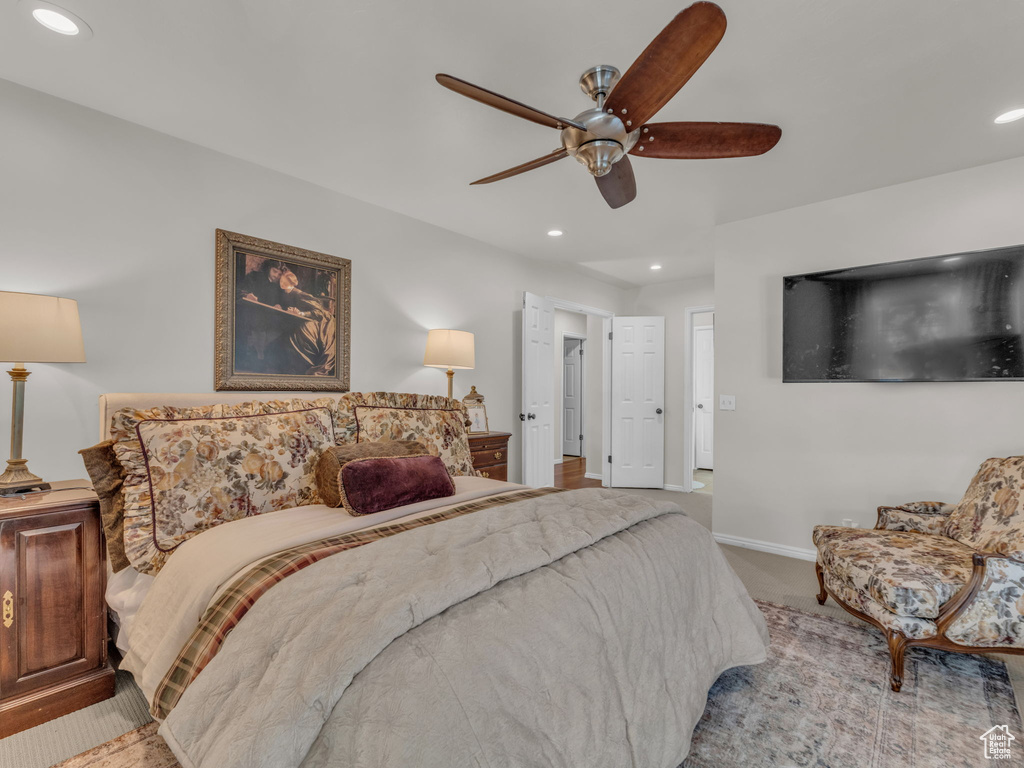 Bedroom with carpet flooring, recessed lighting, and ceiling fan
