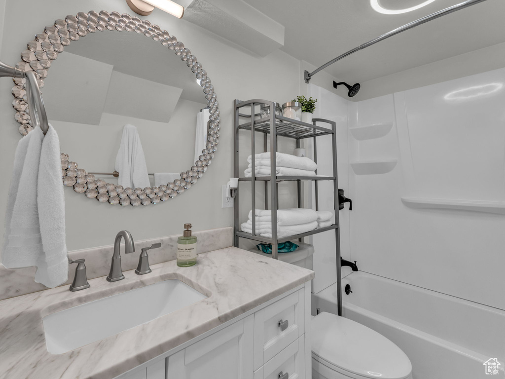 Full bathroom featuring bathing tub / shower combination and vanity