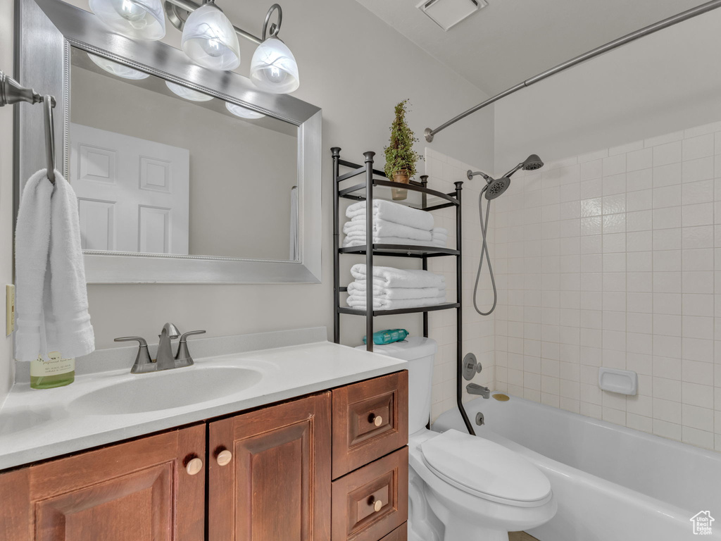 Full bath featuring vanity and tub / shower combination